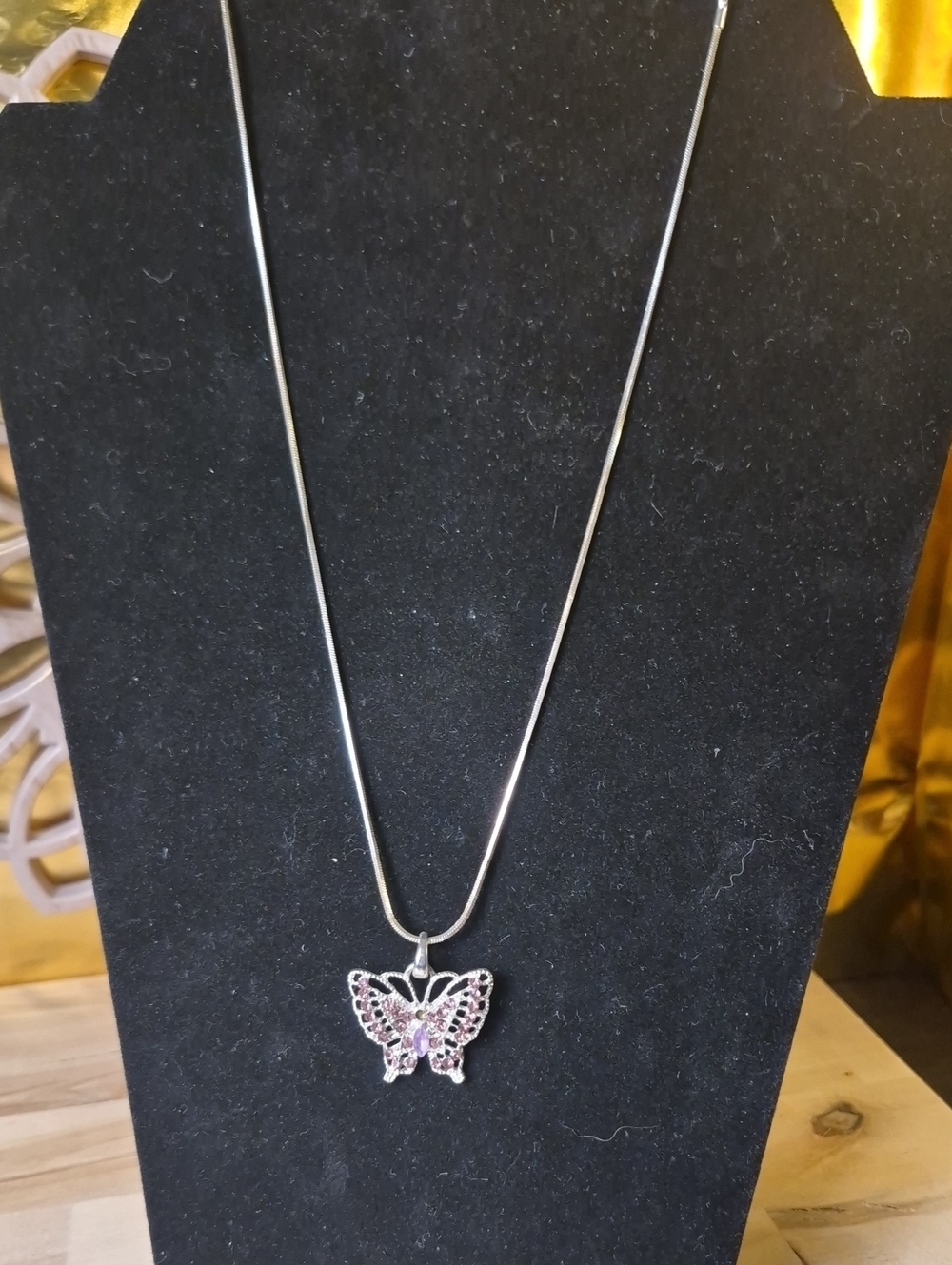 Silver Butterfly Pendant Necklace with Pink Gem Accents